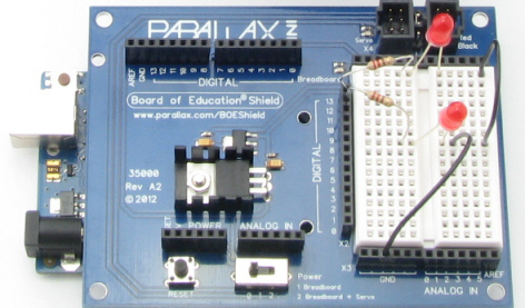 Board of Education Shield with two red LED circuits built onto its breadboard