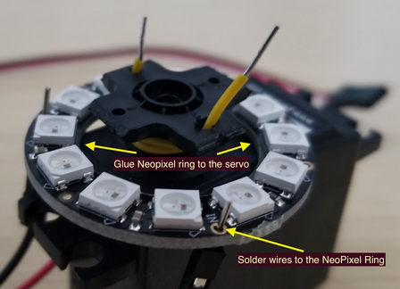 Glue the NeoPixel ring to the servo body.