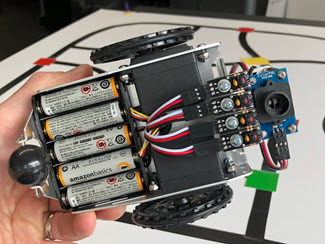 Underside view of the ActivityBot showing QTI and ColorPal connections.