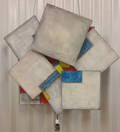 6 overlapping gray canvas panels rotated at different angles, revealing bright primary colors underneath