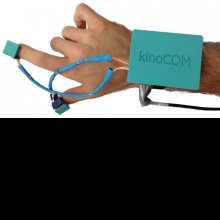KinoCOM prototype on an arm.